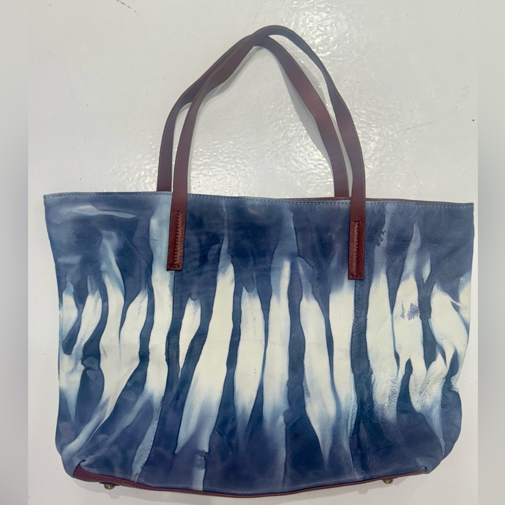 Brand New, Never been worn genuine lamb skin leather tie dye tote in purple/blue